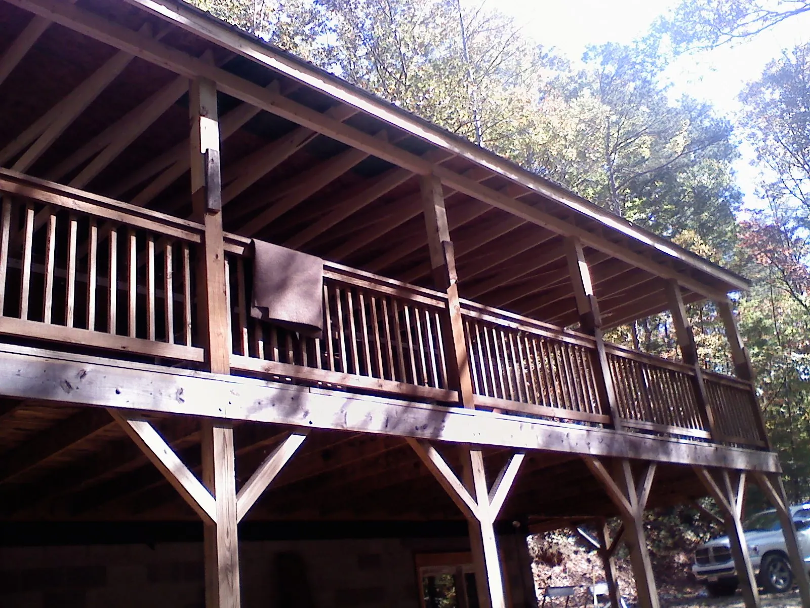 Timber framing under a new elevated porch and deck — Roof Leak Repair in Tupelo by Roofing Brothers